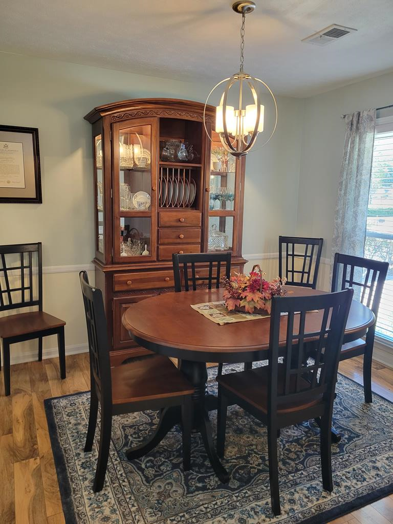 4202 Cheshire Bridge Road Columbus, GA 31909 - Photo 10 of 47 a view of a dining room with furniture