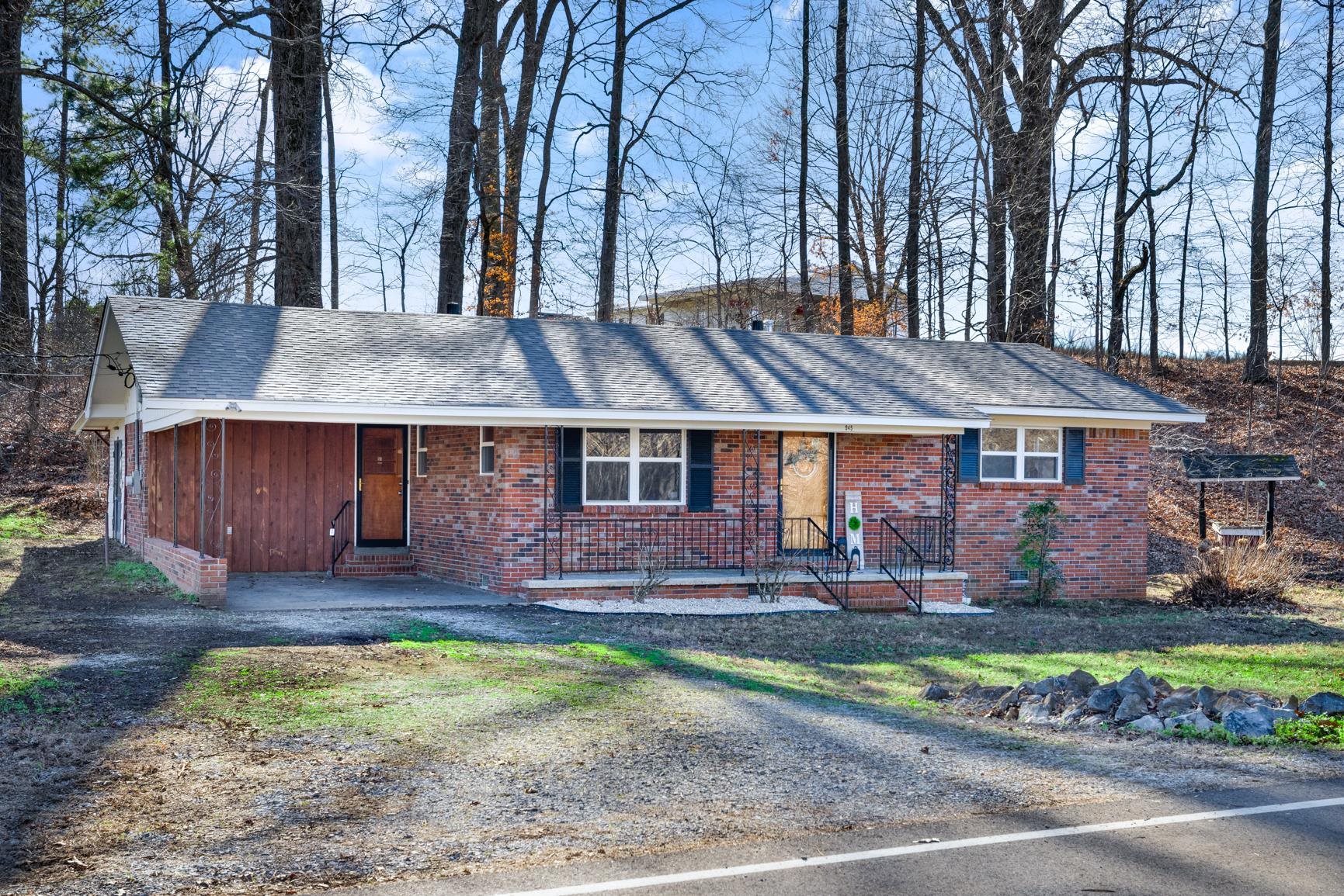 945 Gay Road Burlison, TN 38015 - Photo 5 of 27 Single story home featuring a shingled roof, a porch, and brick siding