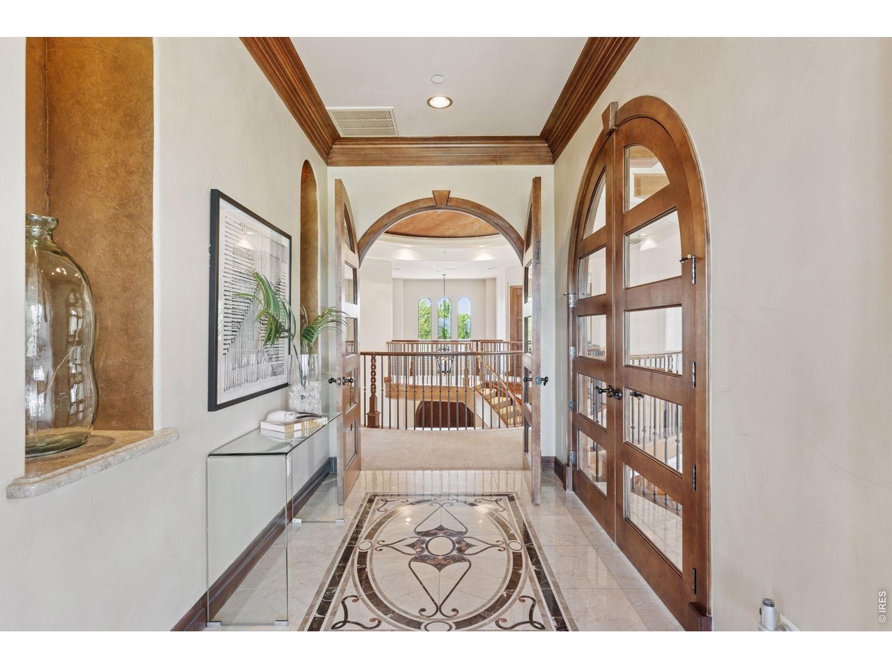6541 Legend Ridge Trail Niwot, CO 80503 - Photo 23 of 45 a view of a living room and a wooden floor