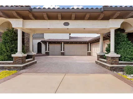 a front view of a house with swimming pool