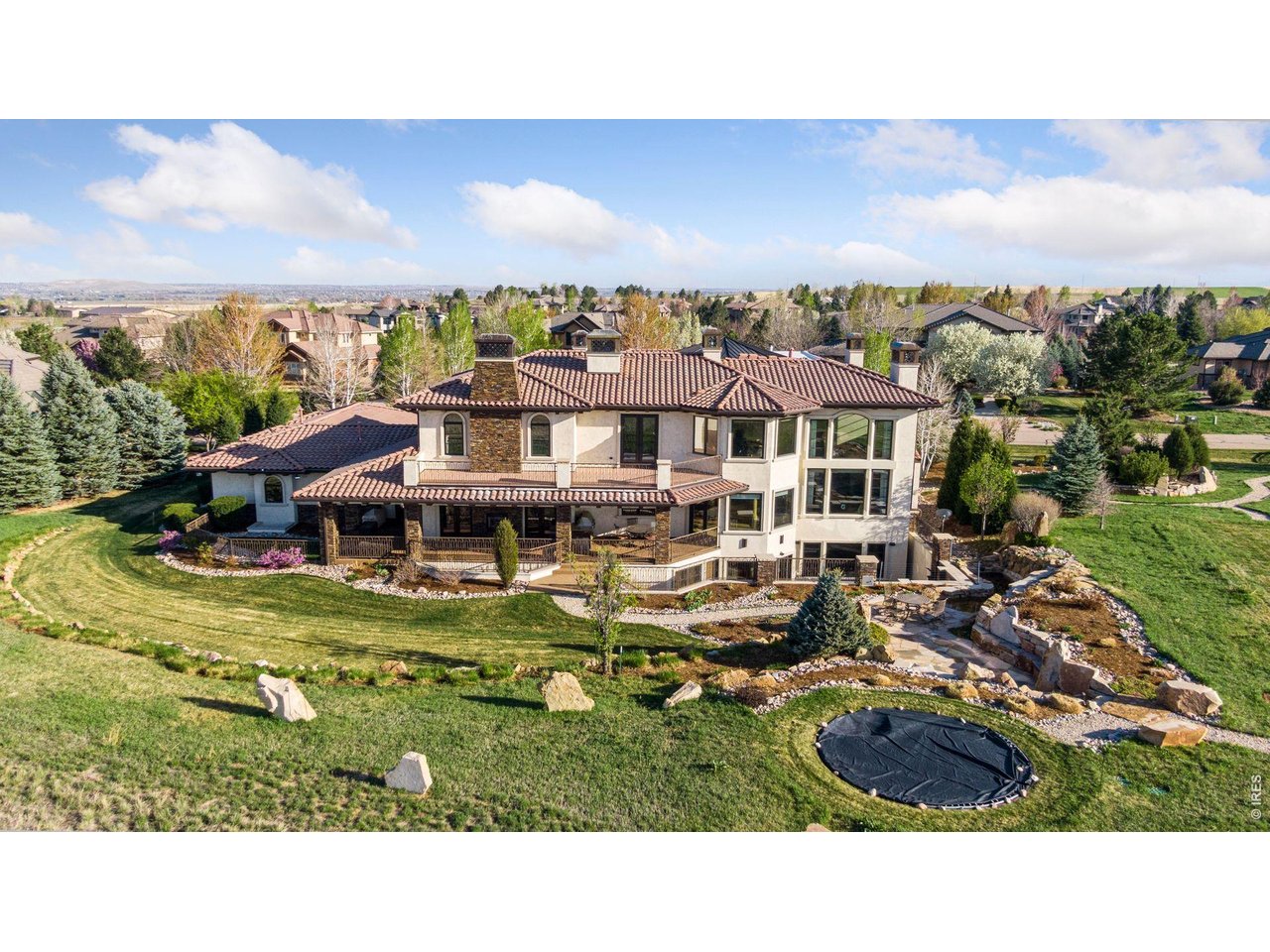 6541 Legend Ridge Trail Niwot, CO 80503 - Photo 40 of 45 a aerial view of a house with a garden