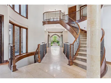 a view of an entryway with staircase