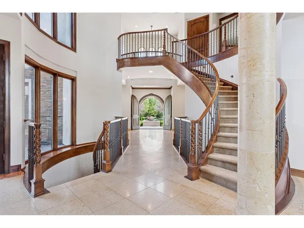 a view of an entryway with staircase