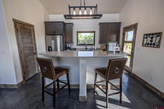 a bathroom with a sink a toilet and bathtub
