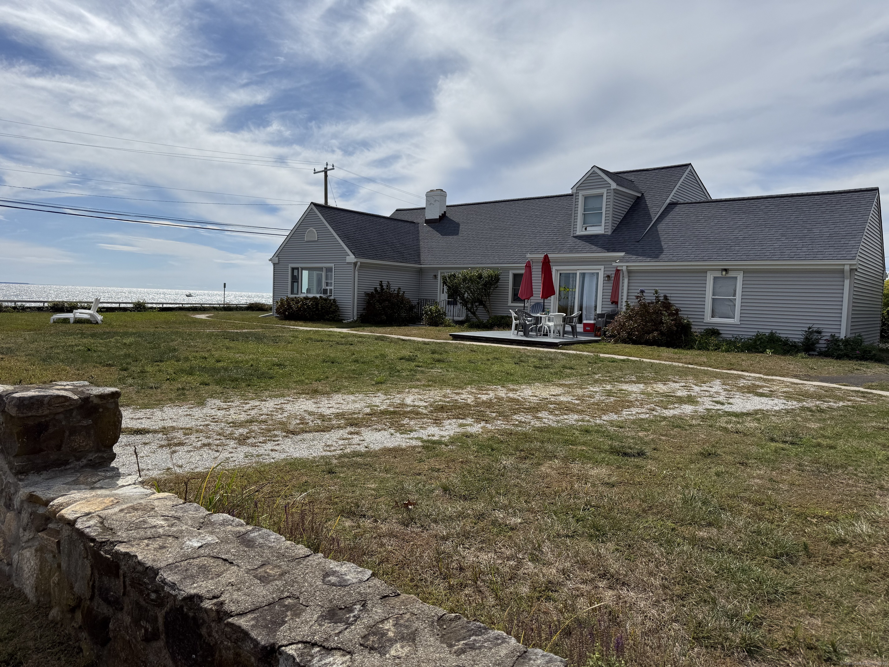 1 Fenwood Drive Old Saybrook, CT 06475 - Photo 11 of 15 a view of a house with a yard