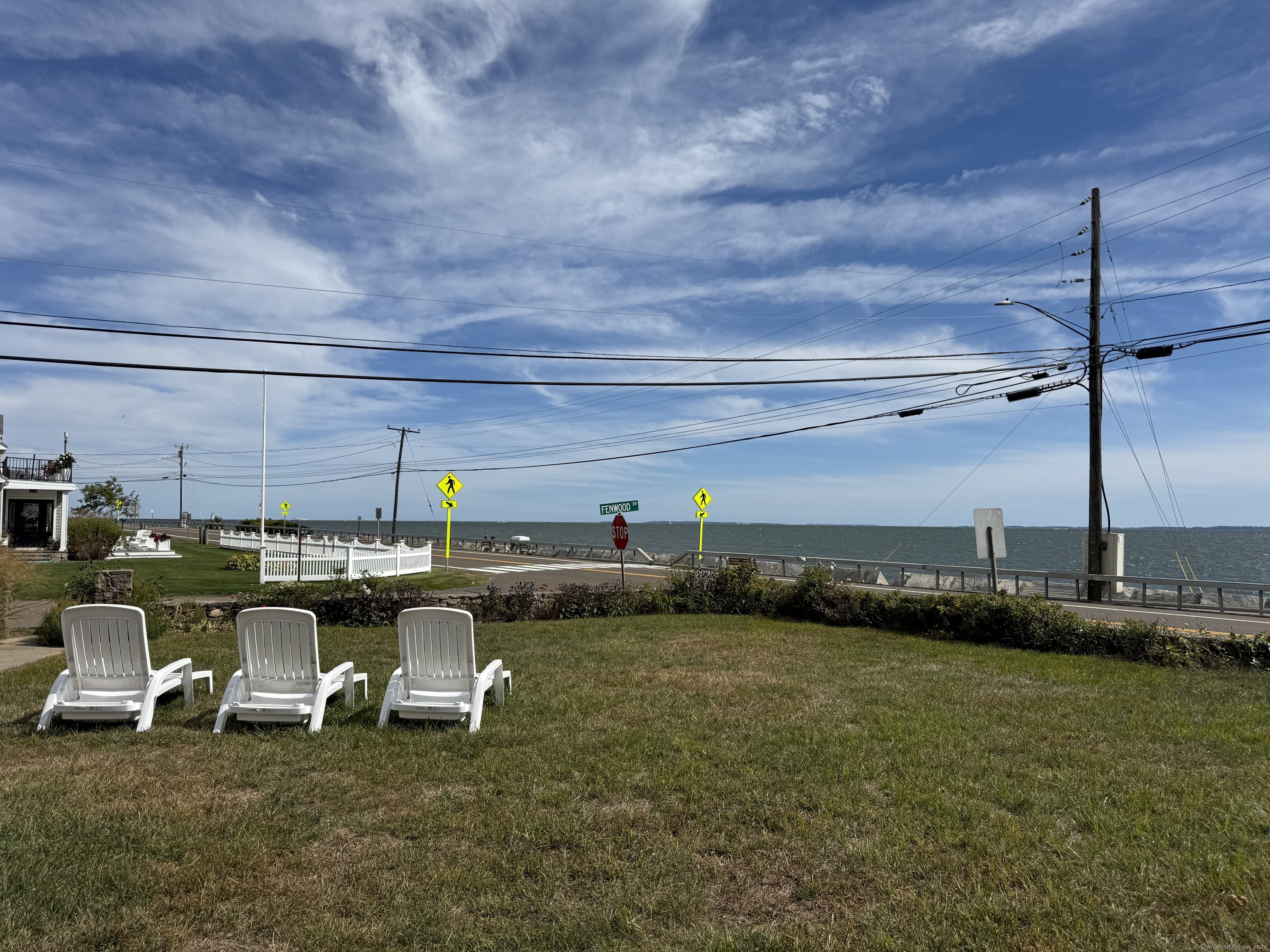 1 Fenwood Drive Old Saybrook, CT 06475 - Photo 13 of 15 a living room with lots of furniture and clutter