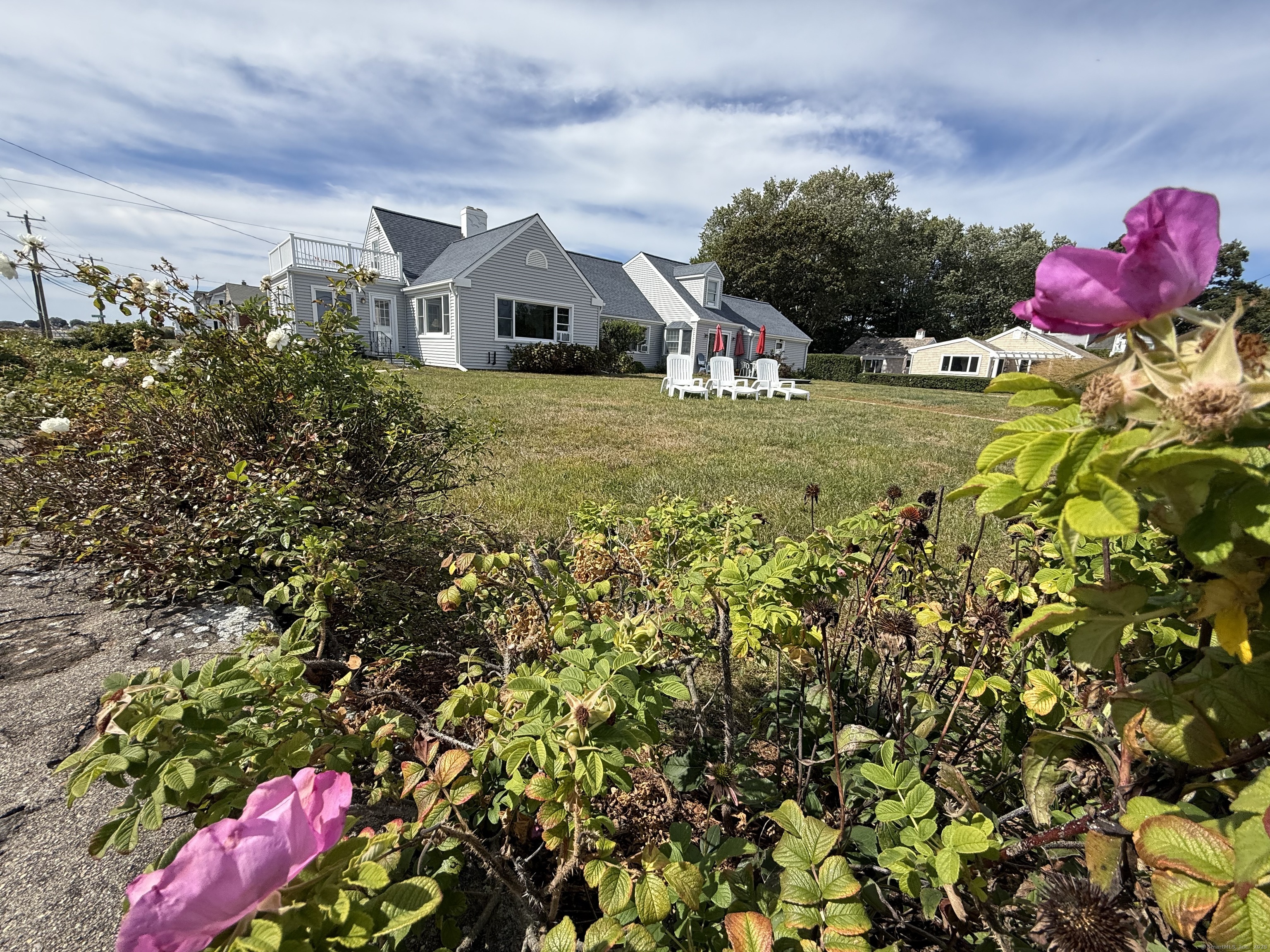 1 Fenwood Drive Old Saybrook, CT 06475 - Photo 14 of 15 a front view of a house with yard