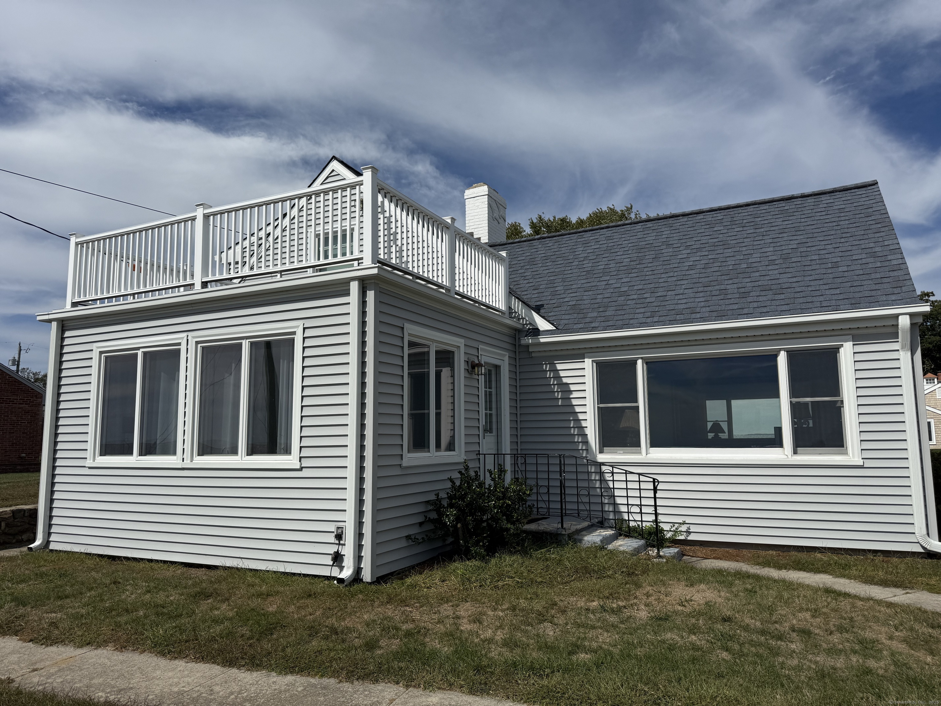 1 Fenwood Drive Old Saybrook, CT 06475 - Photo 3 of 15 a view of a house with a yard