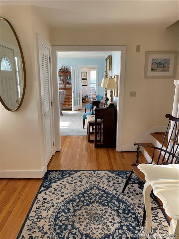 1 Fenwood Drive Old Saybrook, CT 06475 - Photo 9 of 15 a living room with furniture and a rug