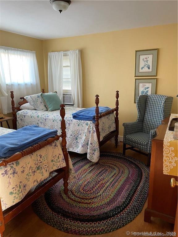 1 Fenwood Drive Old Saybrook, CT 06475 - Photo 10 of 15 a living room with furniture and a lamp