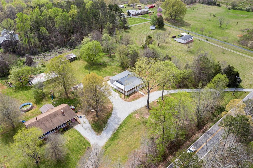 1526 Junction Road Mocksville, NC 27028 - Photo 1 of 28 an aerial view of residential houses with outdoor space