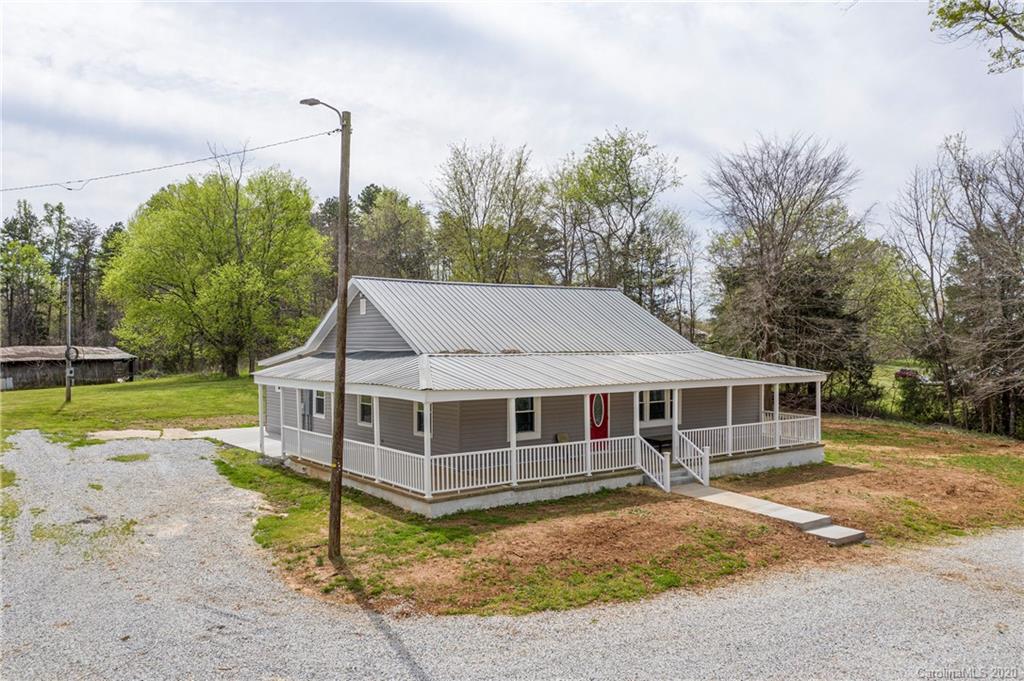 1526 Junction Road Mocksville, NC 27028 - Photo 3 of 28 a view of a house with a yard and sitting area