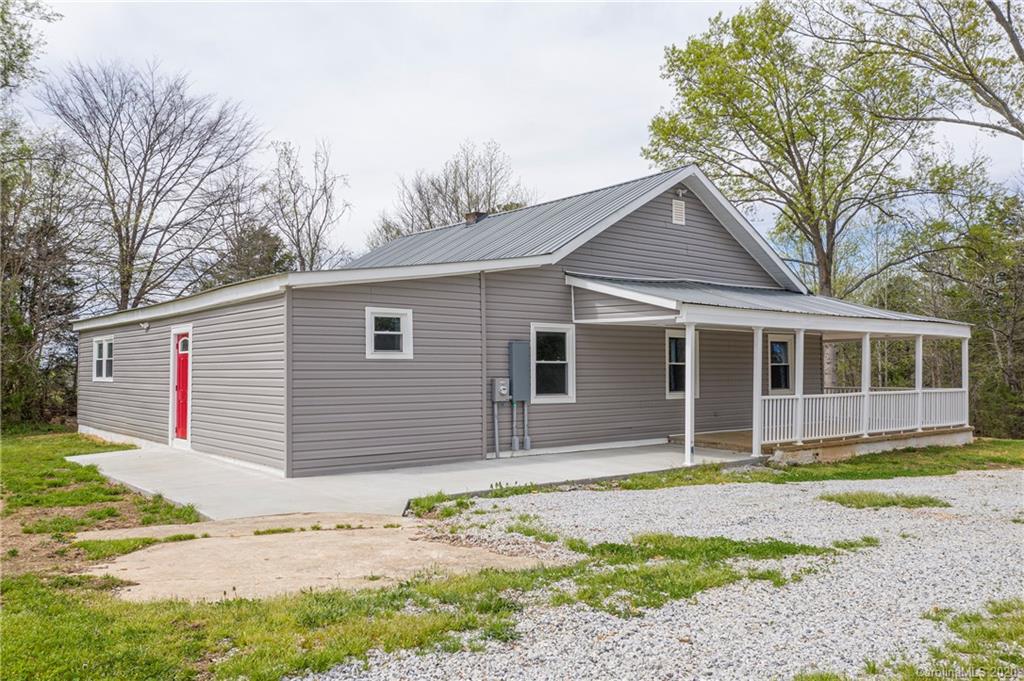 1526 Junction Road Mocksville, NC 27028 - Photo 4 of 28 a front view of a house with a yard