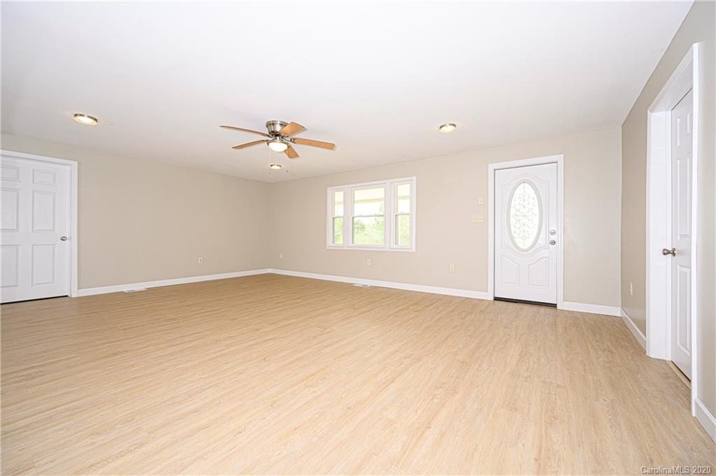 1526 Junction Road Mocksville, NC 27028 - Photo 10 of 28 an empty room with windows and closet