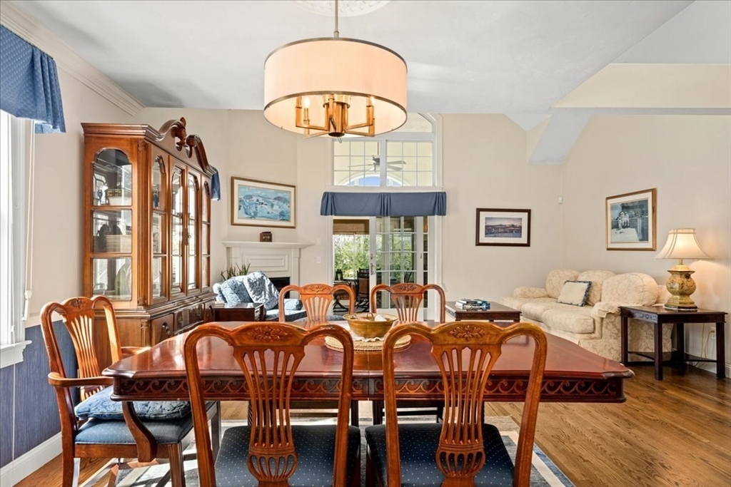 7 Primmett Lane, Unit 7 Worcester, MA 01609 - Photo 10 of 38 a view of a dining room with furniture window and wooden floor