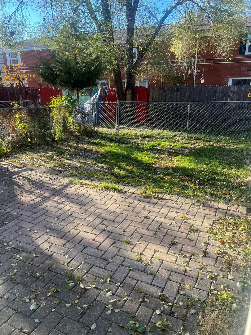 823 McHenry Road, Unit C Wheeling, IL 60090 - Photo 7 of 7 a view of a backyard