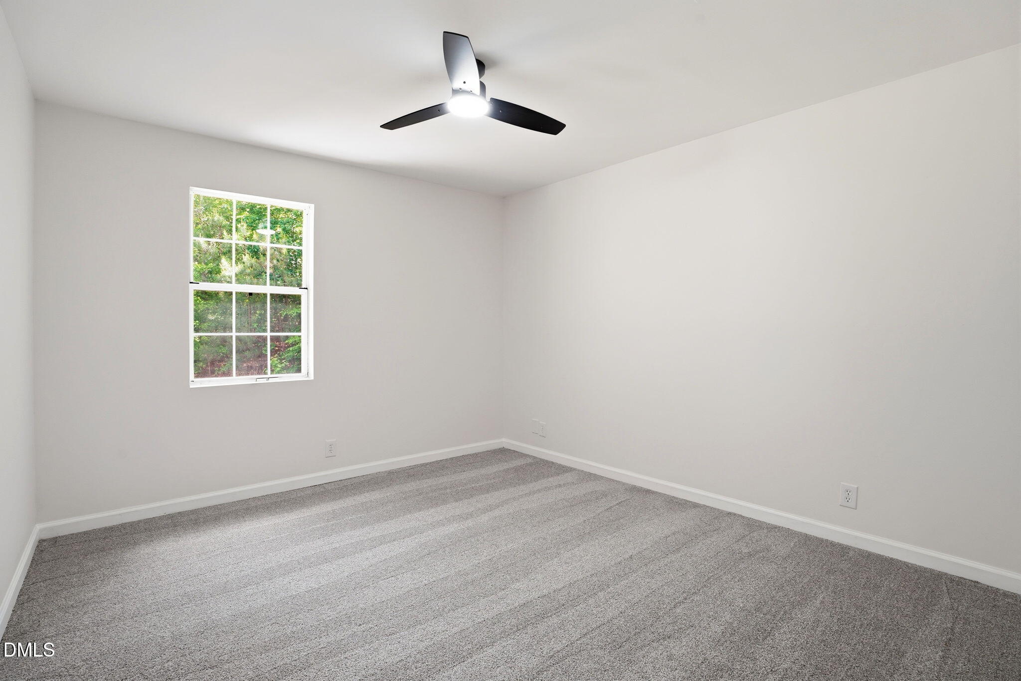 3602 Harrison Road Castalia, NC 27816 - Photo 37 of 48 an empty room with a window
