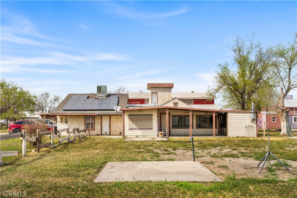 14433 Roy Rogers Road Oro Grande, CA 92368 - Photo 7 of 22 a front view of a house with a yard