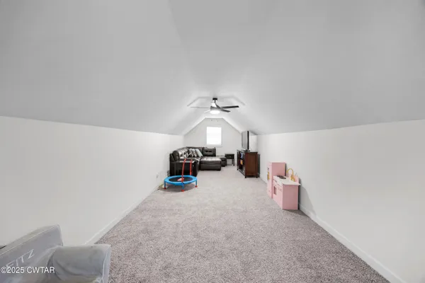 a view of a livingroom and a garage