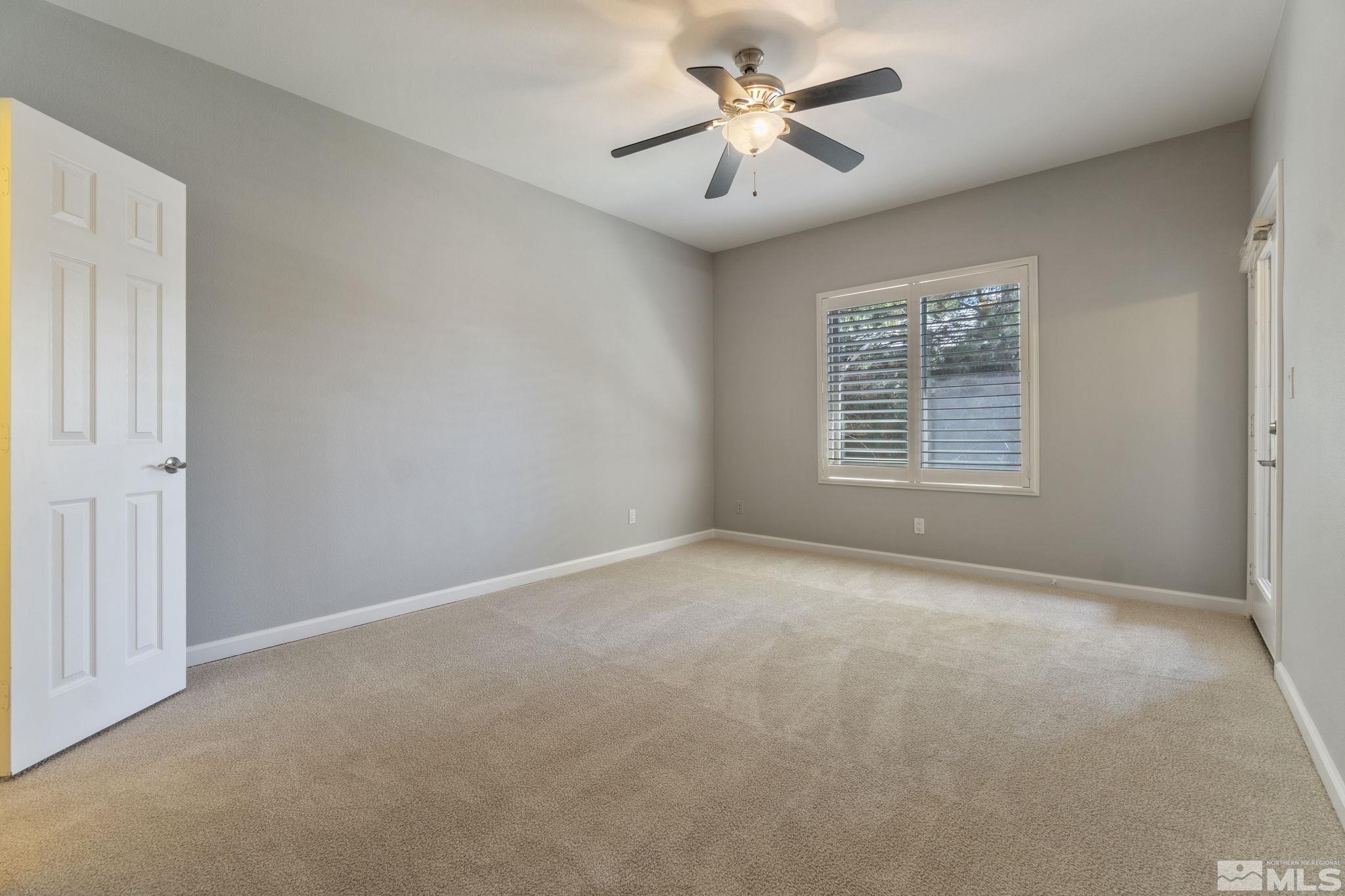 900 South Meadows Parkway, Unit 223 Reno, NV 89521 - Photo 17 of 40 a view of an empty room with a window