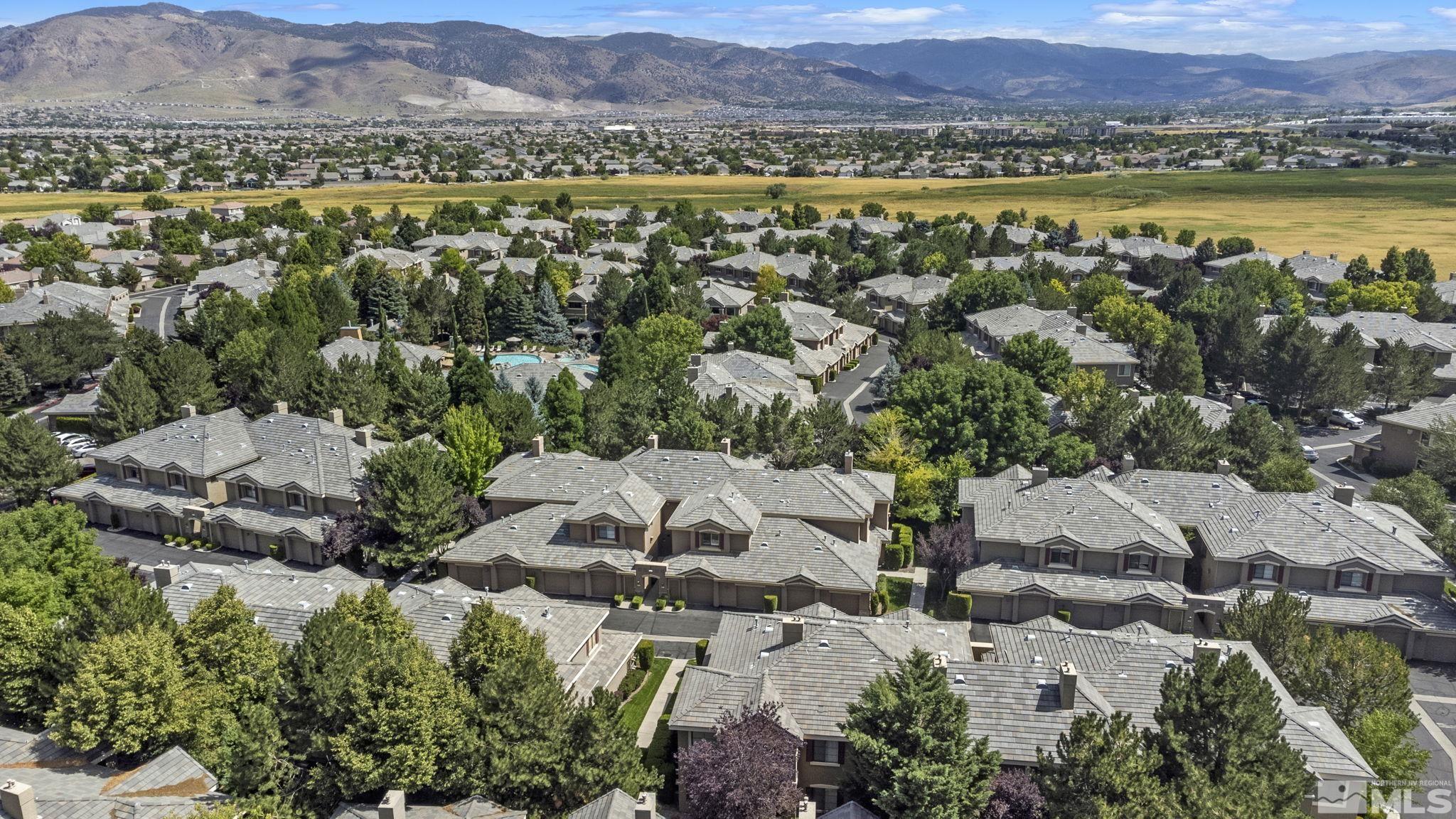 900 South Meadows Parkway, Unit 223 Reno, NV 89521 - Photo 2 of 40 an aerial view of residential house with outdoor space