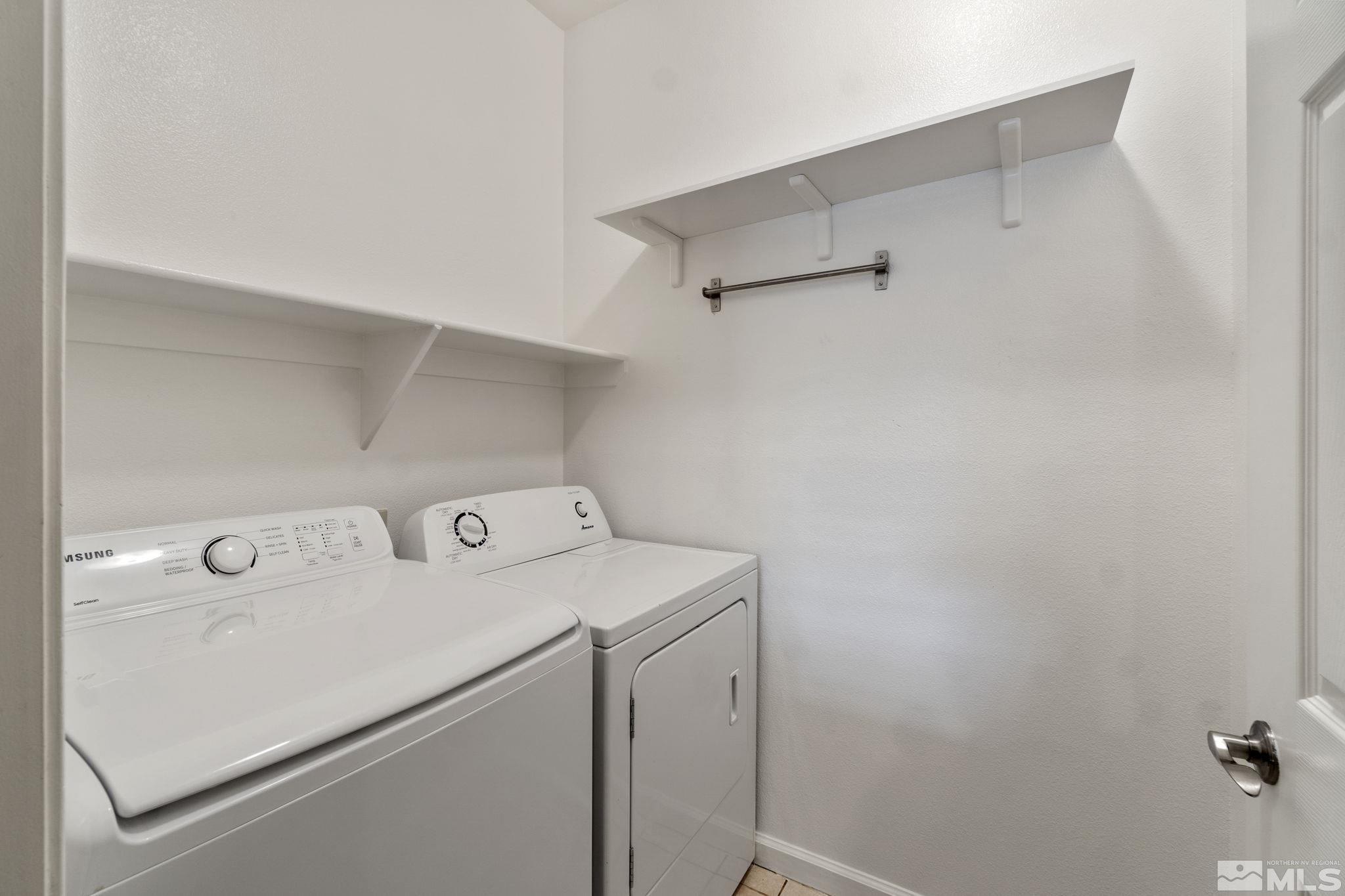 900 South Meadows Parkway, Unit 223 Reno, NV 89521 - Photo 26 of 40 a utility room with dryer and washer