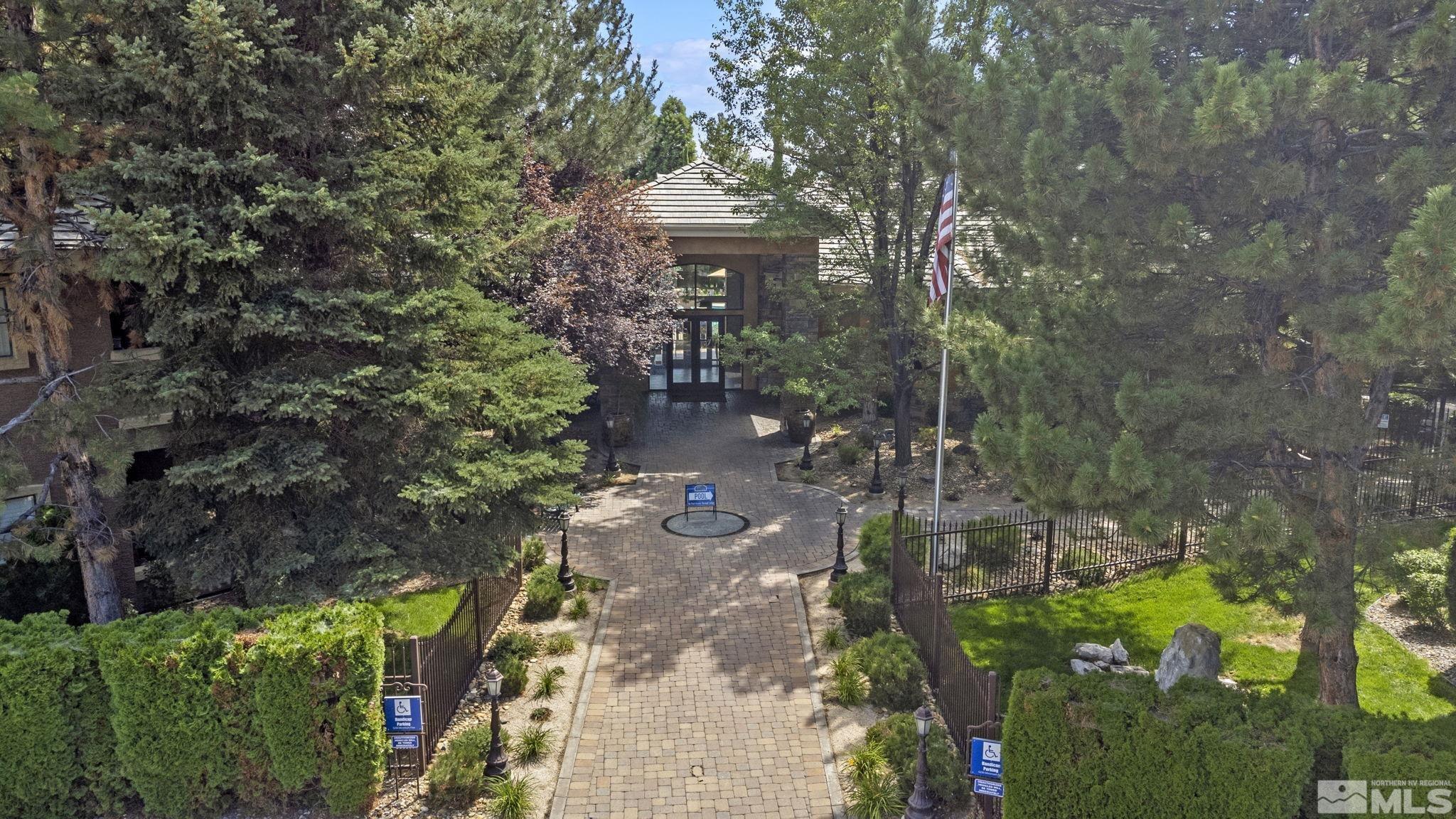 900 South Meadows Parkway, Unit 223 Reno, NV 89521 - Photo 28 of 40 a backyard of a house with lots of green space