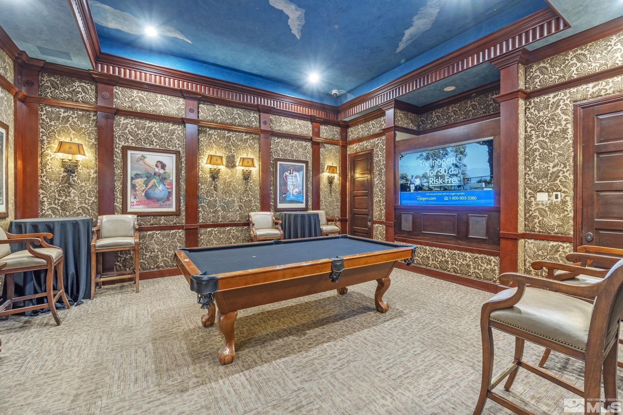 900 South Meadows Parkway, Unit 223 Reno, NV 89521 - Photo 31 of 40 a living room with furniture a ceiling fan and a large window
