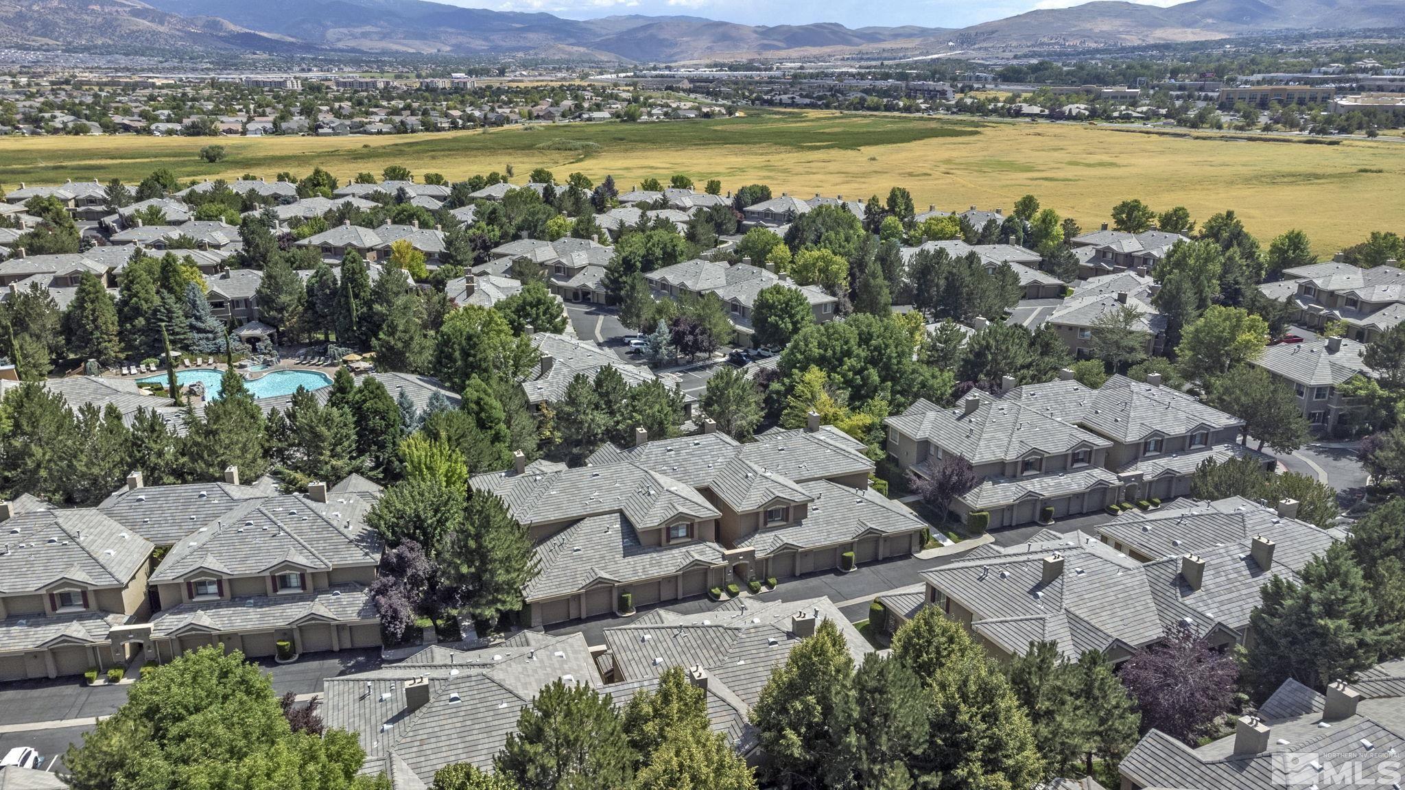 900 South Meadows Parkway, Unit 223 Reno, NV 89521 - Photo 40 of 40 an aerial view of a city with lake view