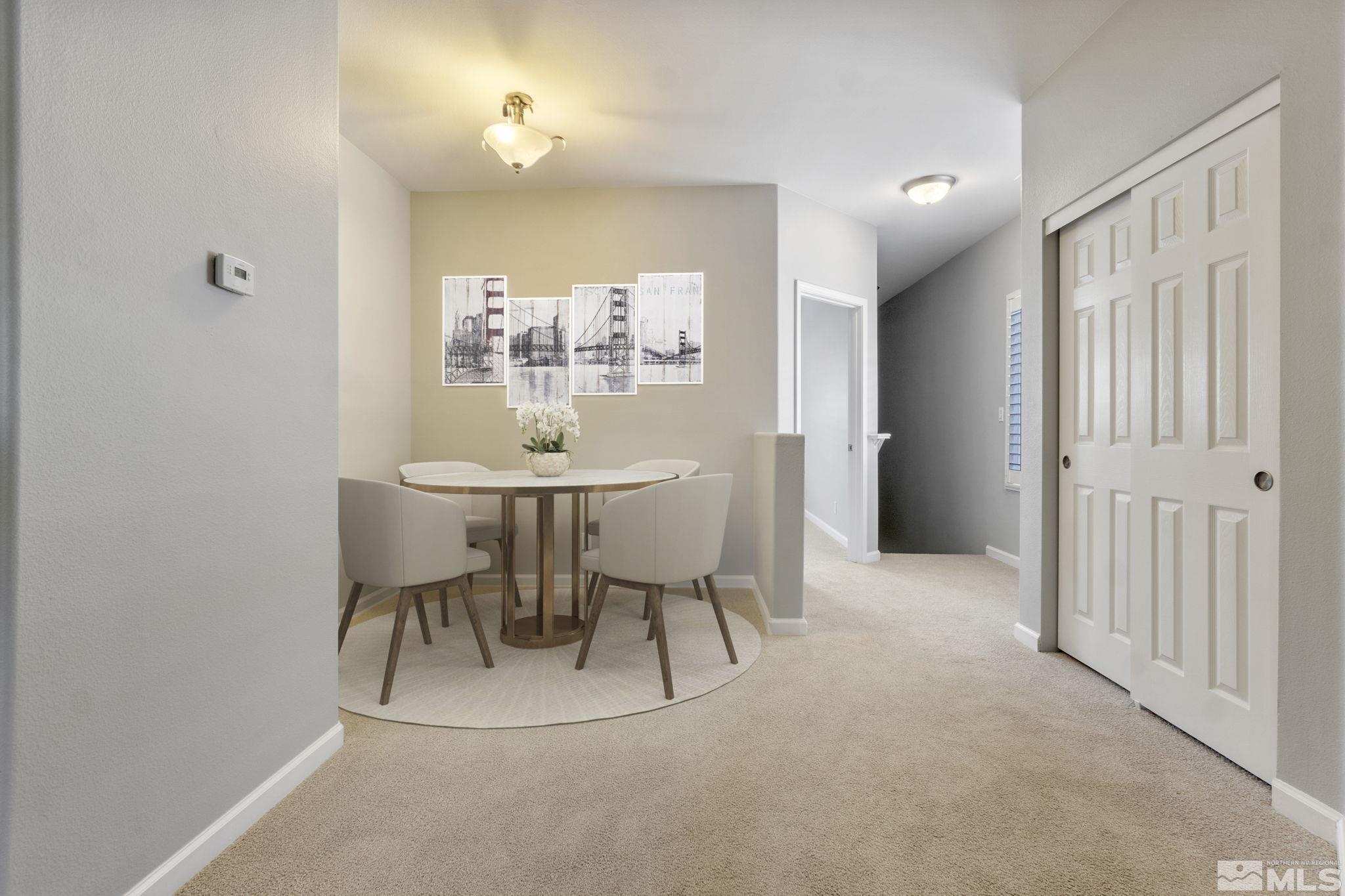900 South Meadows Parkway, Unit 223 Reno, NV 89521 - Photo 4 of 40 a view of a dining room with furniture