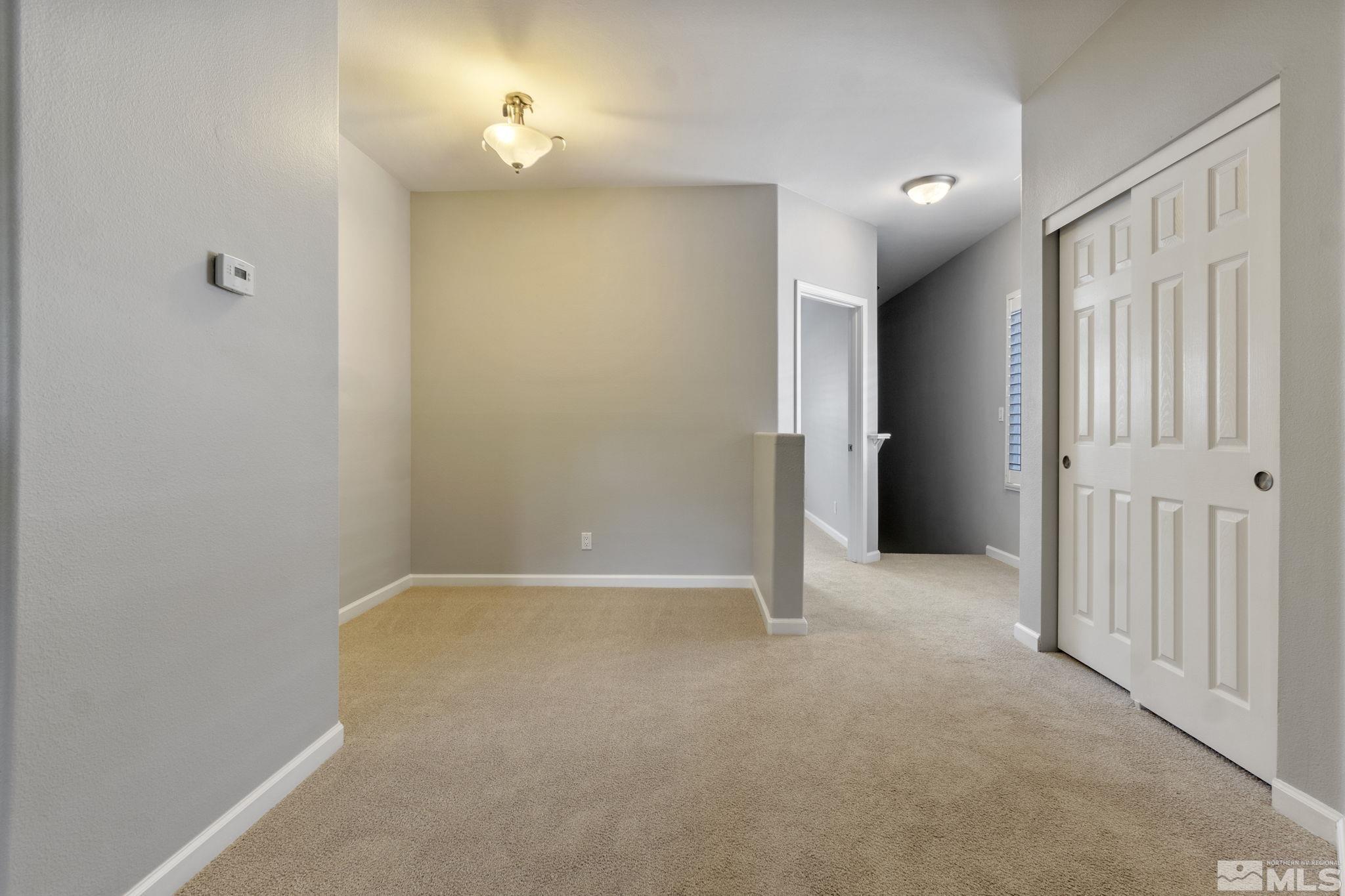 900 South Meadows Parkway, Unit 223 Reno, NV 89521 - Photo 5 of 40 a view of an empty room