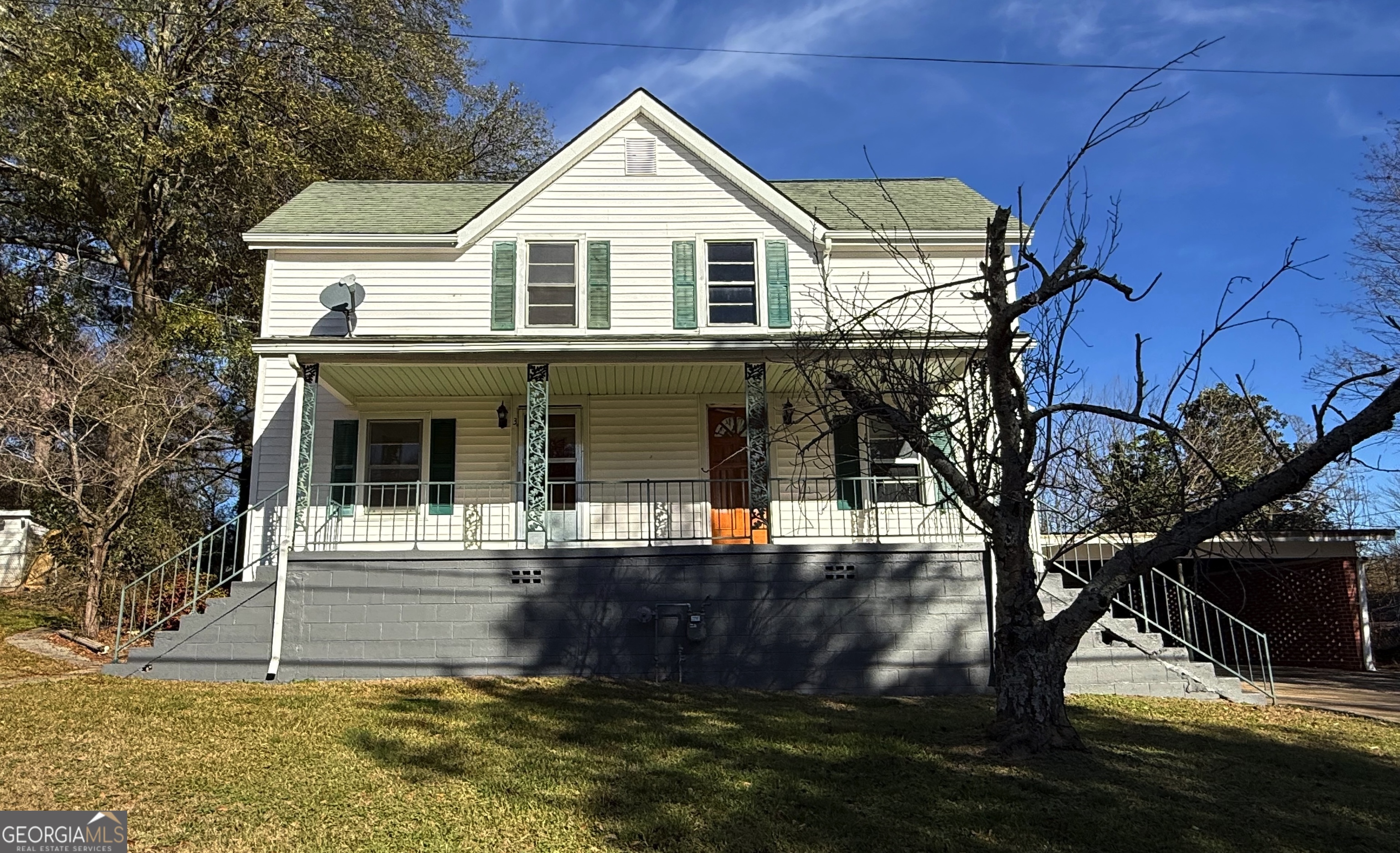 3 Liberty Street Gainesville, GA 30501 - Photo 1 of 8 a front view of a house with garden