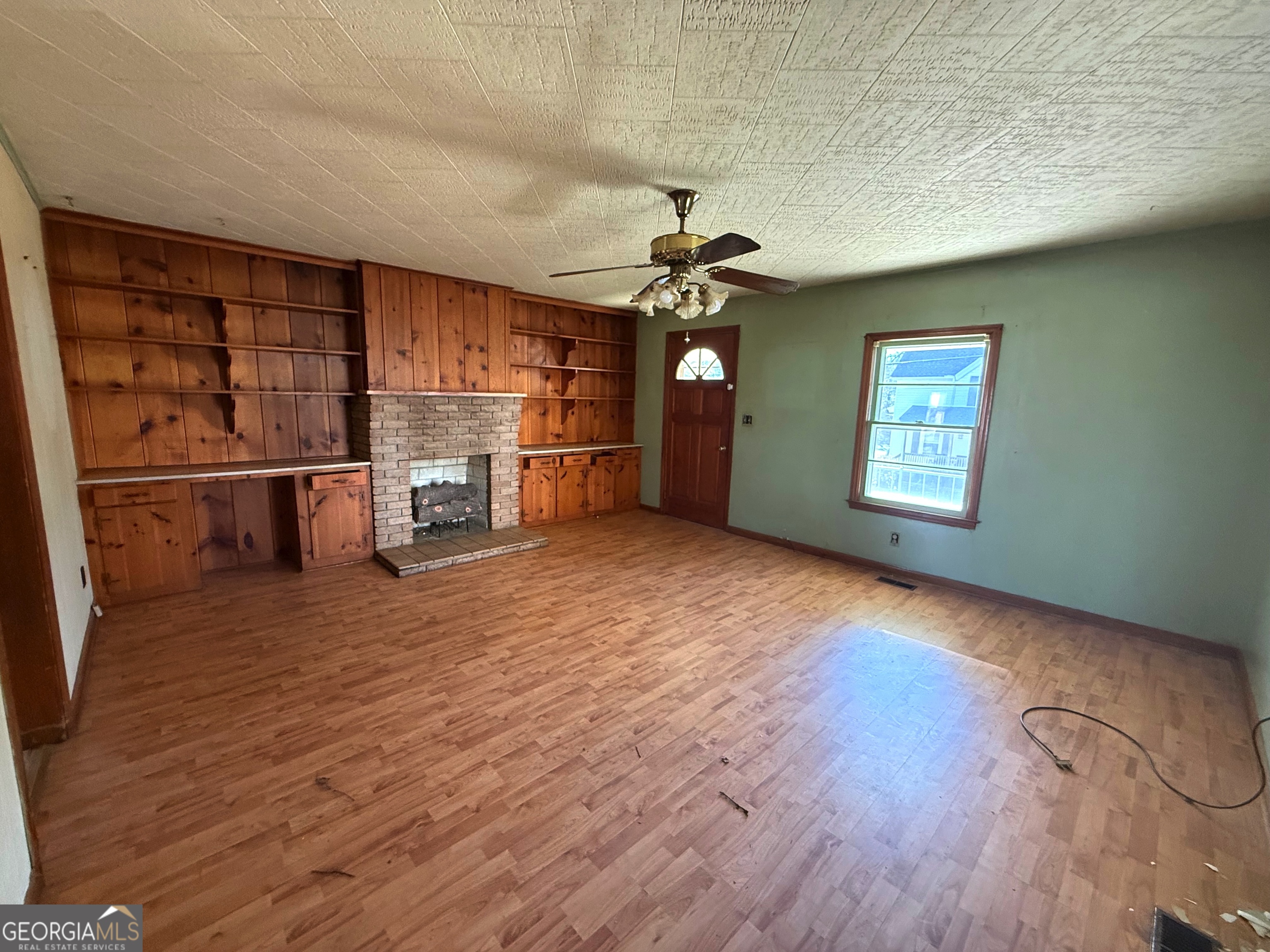 3 Liberty Street Gainesville, GA 30501 - Photo 2 of 8 an empty room with a empty space and windows