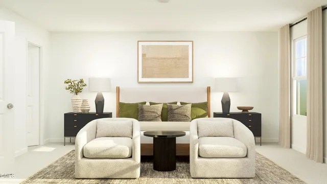 a bedroom with a bed flat screen tv and window