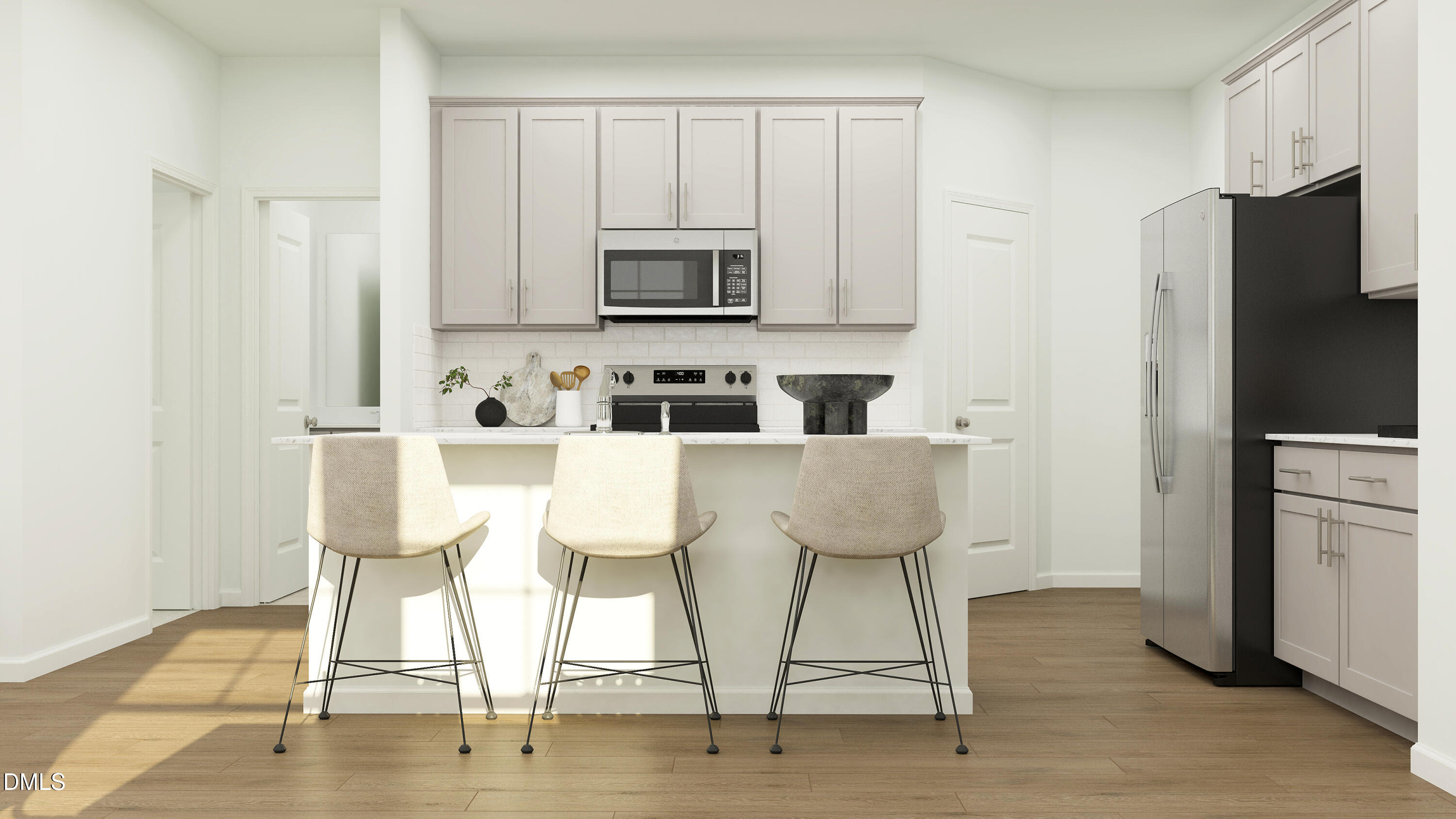 192 Redford Pl Drive Rolesville, NC 27571 - Photo 2 of 24 a kitchen with stainless steel appliances kitchen island granite countertop a dining table chairs and a refrigerator