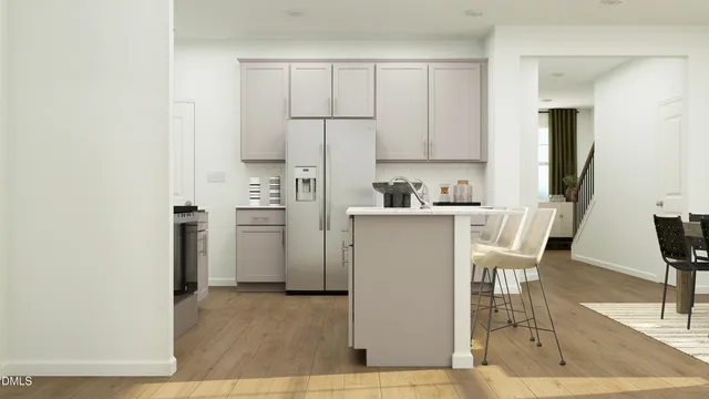 a view of a dining room with furniture and window