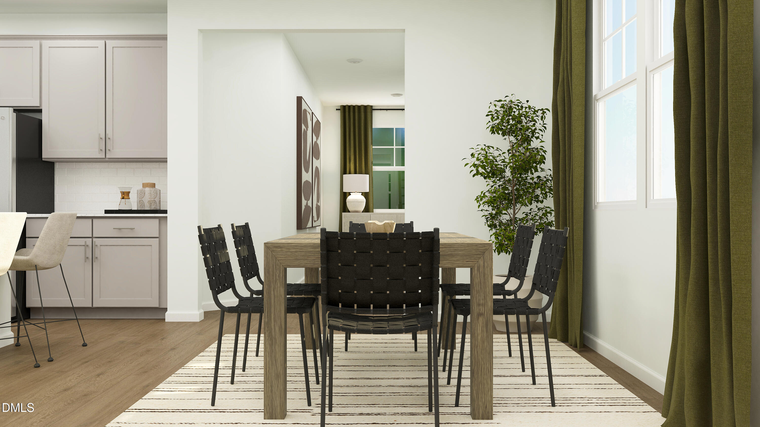 192 Redford Pl Drive Rolesville, NC 27571 - Photo 5 of 24 a view of a dining room with furniture and wooden floor