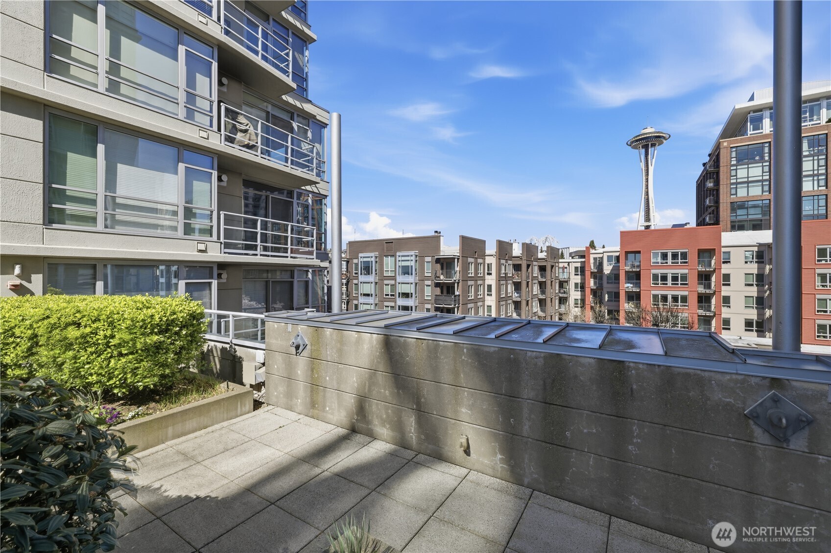 2929 1st Avenue, Unit 201 Seattle, WA 98121 - Photo 18 of 35 a view of a building with a outdoor space