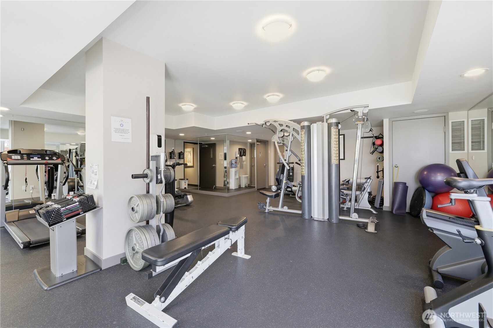 2929 1st Avenue, Unit 201 Seattle, WA 98121 - Photo 24 of 35 a view of a room with gym equipment