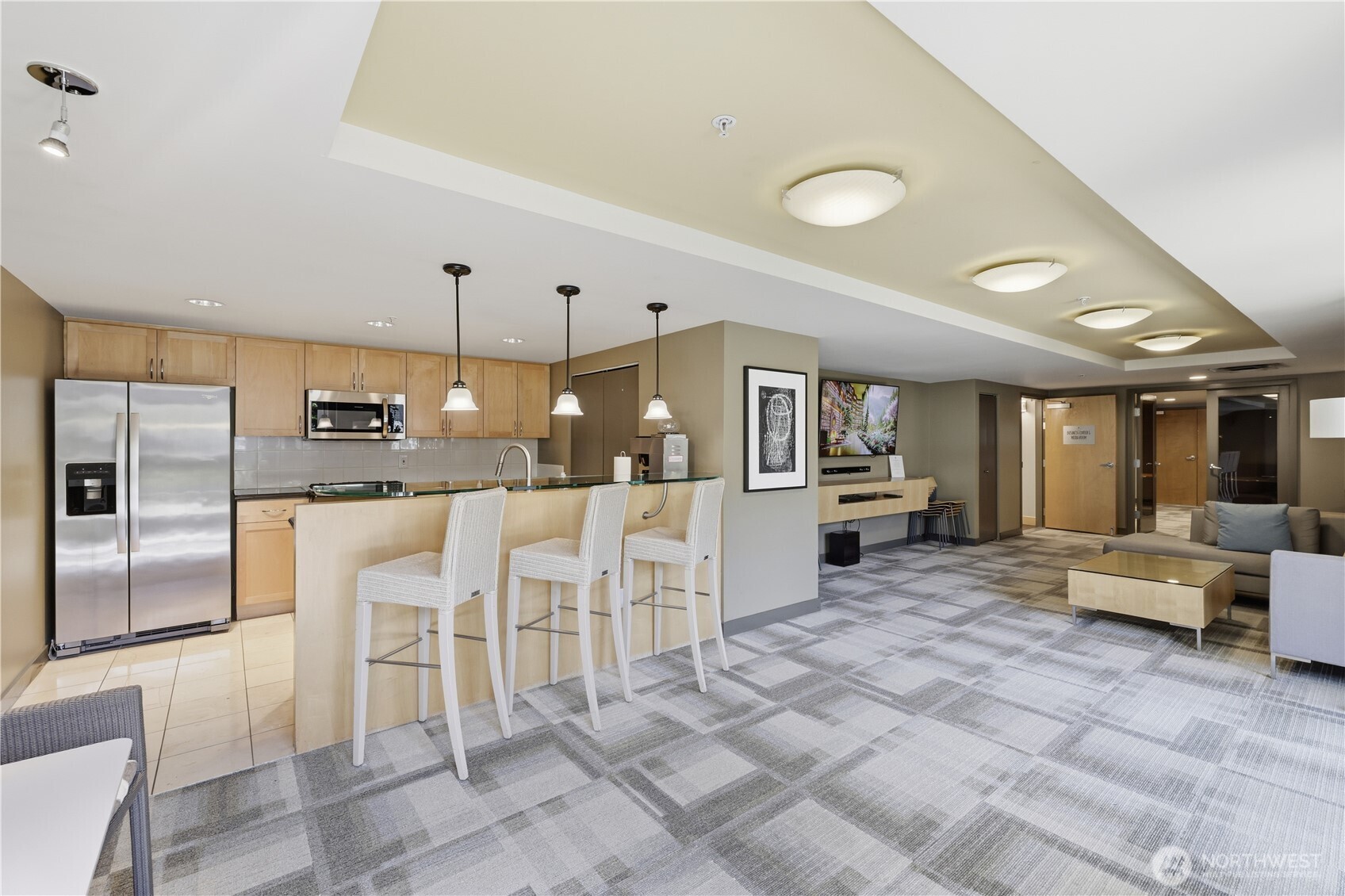 2929 1st Avenue, Unit 201 Seattle, WA 98121 - Photo 29 of 35 a large kitchen with a table and chairs