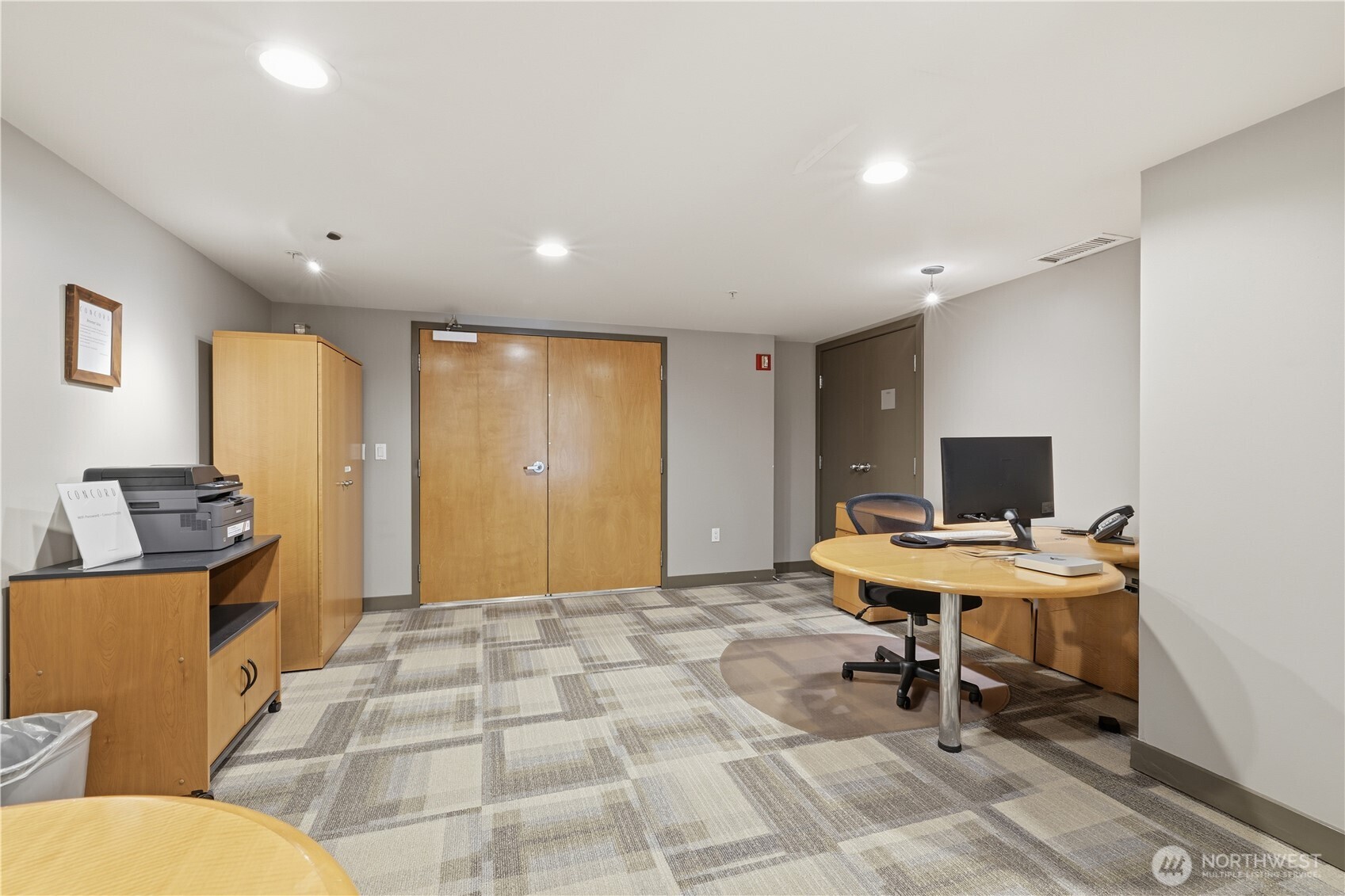 2929 1st Avenue, Unit 201 Seattle, WA 98121 - Photo 32 of 35 a workspace with furniture and window