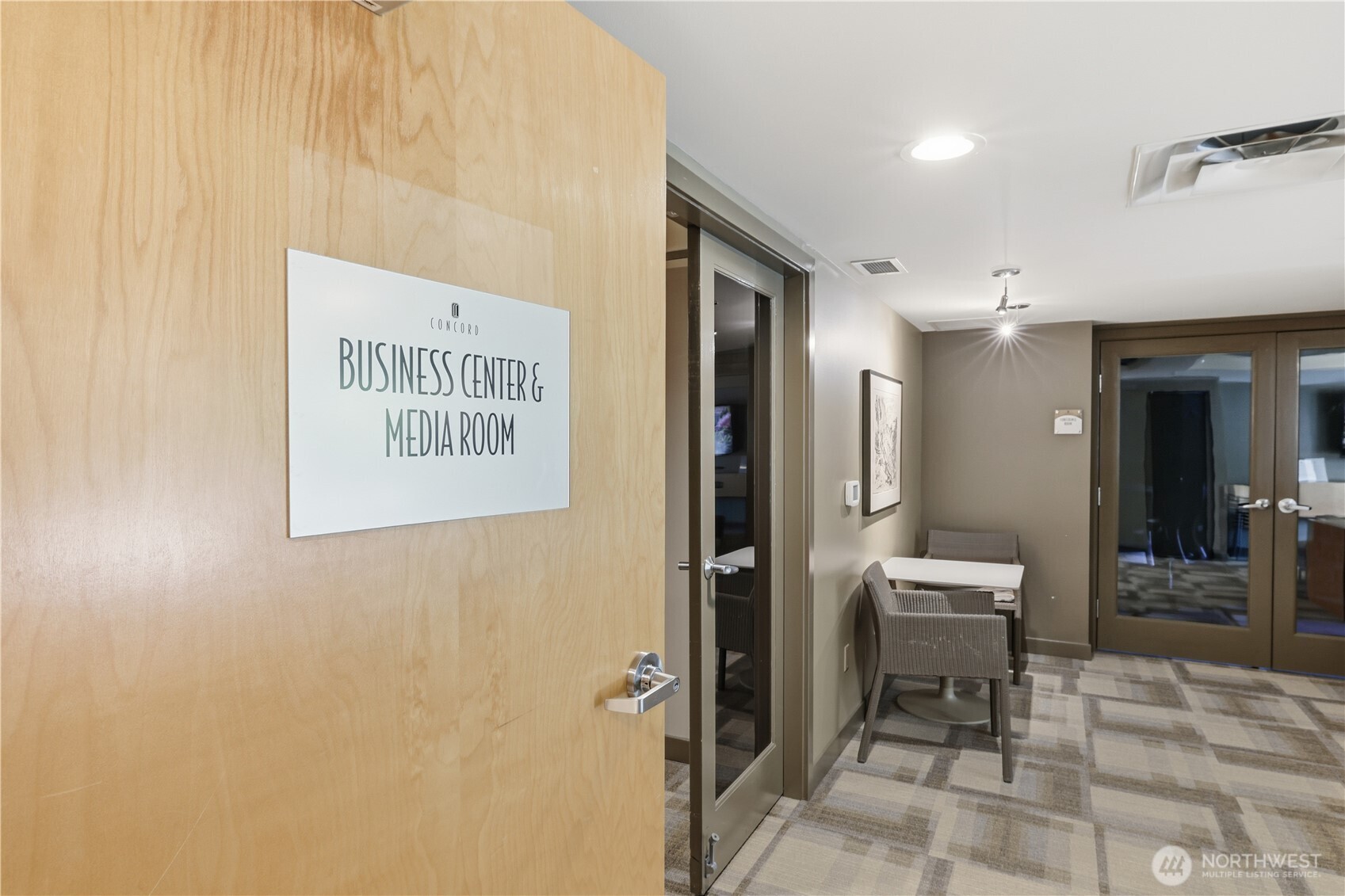 2929 1st Avenue, Unit 201 Seattle, WA 98121 - Photo 33 of 35 a view of a hallway with bathroom
