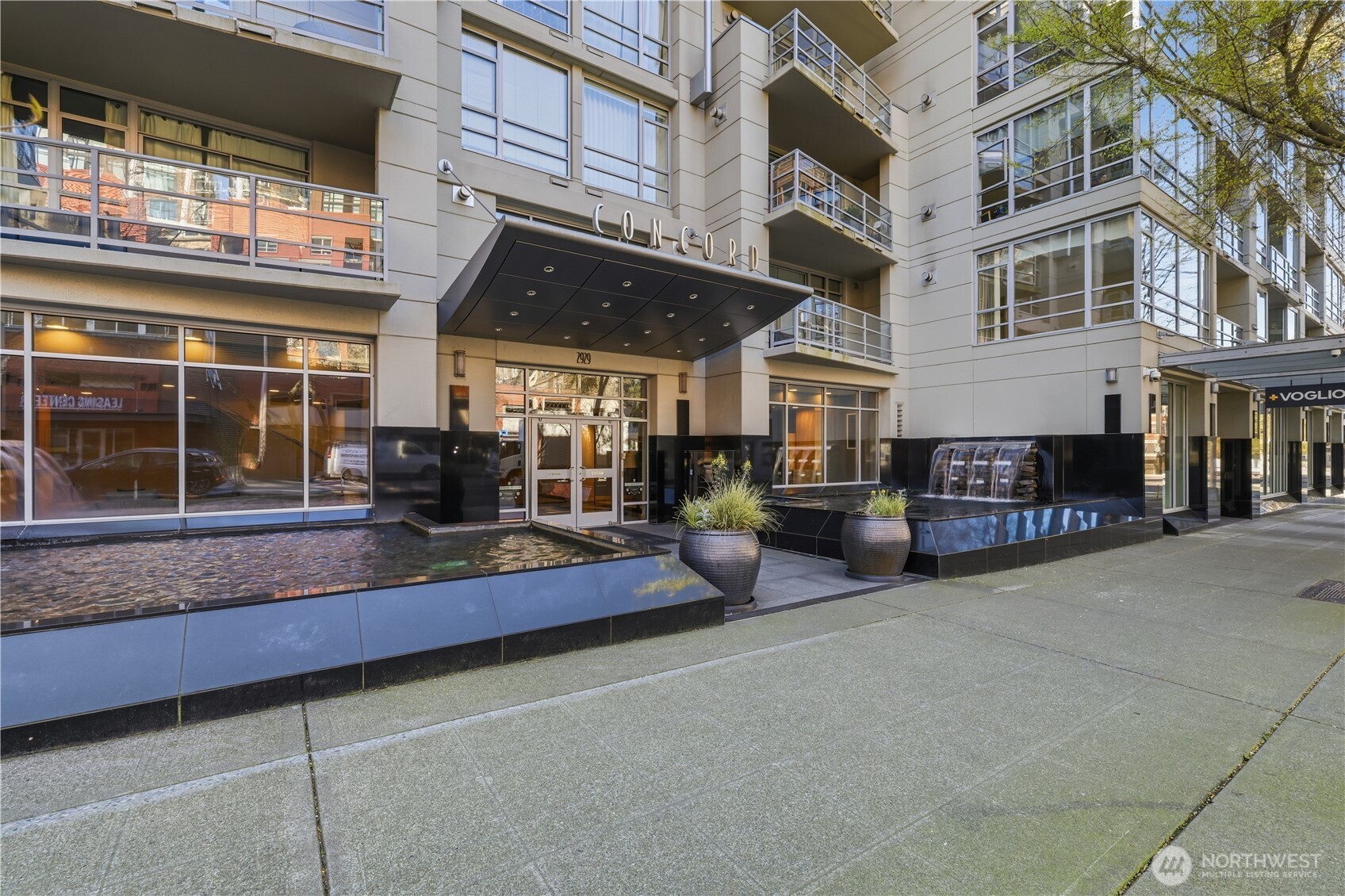 2929 1st Avenue, Unit 201 Seattle, WA 98121 - Photo 35 of 35 a view of a building with sitting area
