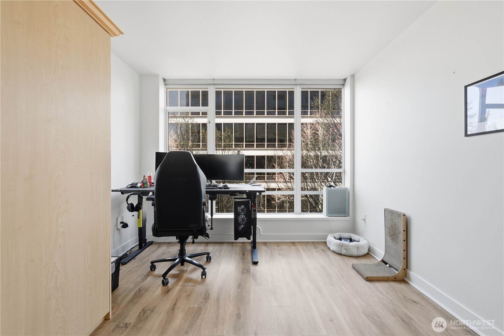2929 1st Avenue, Unit 201 Seattle, WA 98121 - Photo 6 of 35 a work room with furniture and a window
