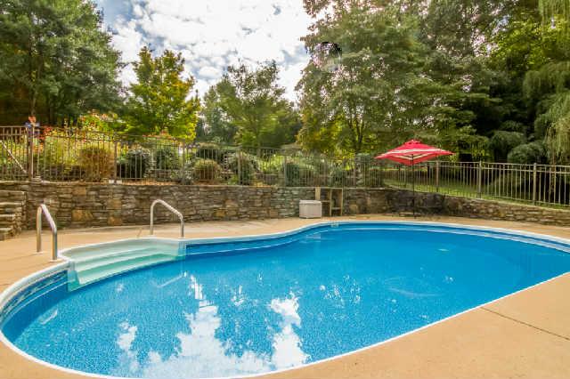 204 Apple Valley Road Lebanon, TN 37087 - Photo 19 of 20 Secluded Kidney Shape Pool Features Newer Liner-Concrete Deck-Metal Fencing