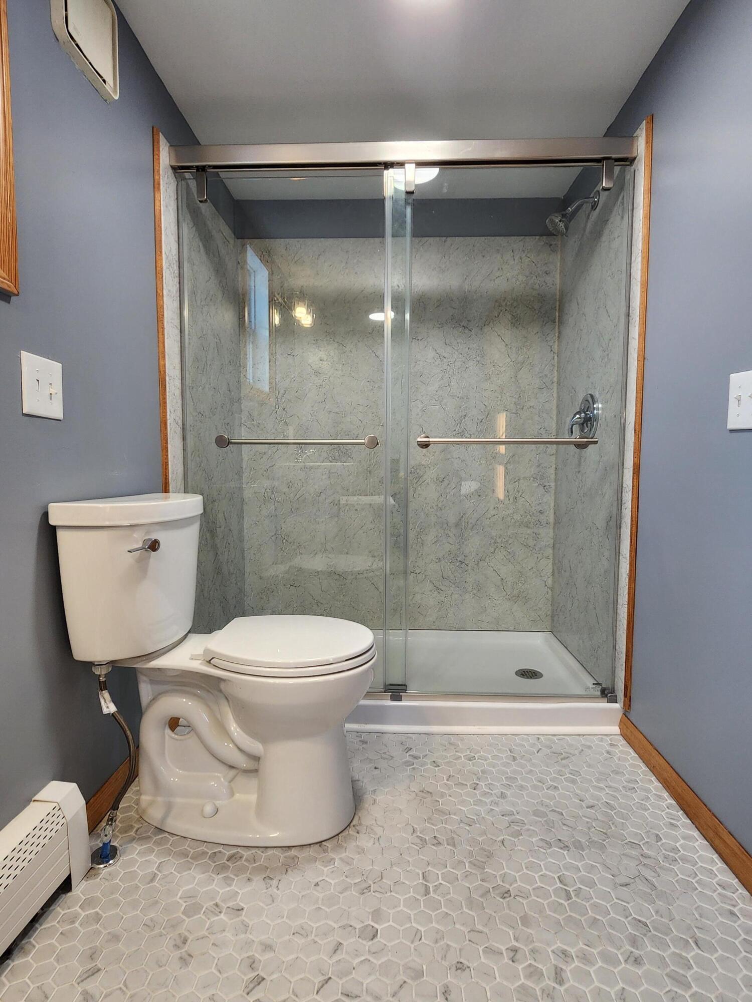 298 Hinckley Road Clinton, ME 04927 - Photo 20 of 28 Primary Ensuite Low Threshold Shower