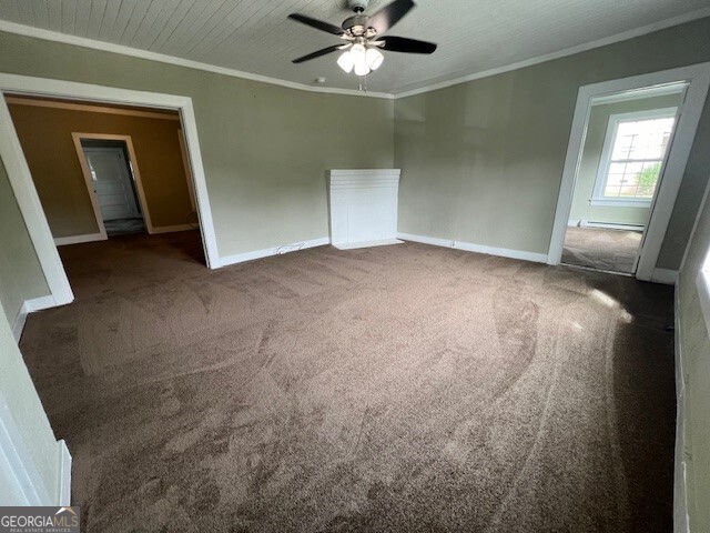103 Grady Street Thomson, GA 30824 - Photo 12 of 27 a view of a livingroom with a ceiling fan and window