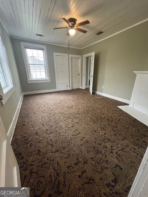 103 Grady Street Thomson, GA 30824 - Photo 26 of 27 a view of an empty room and window