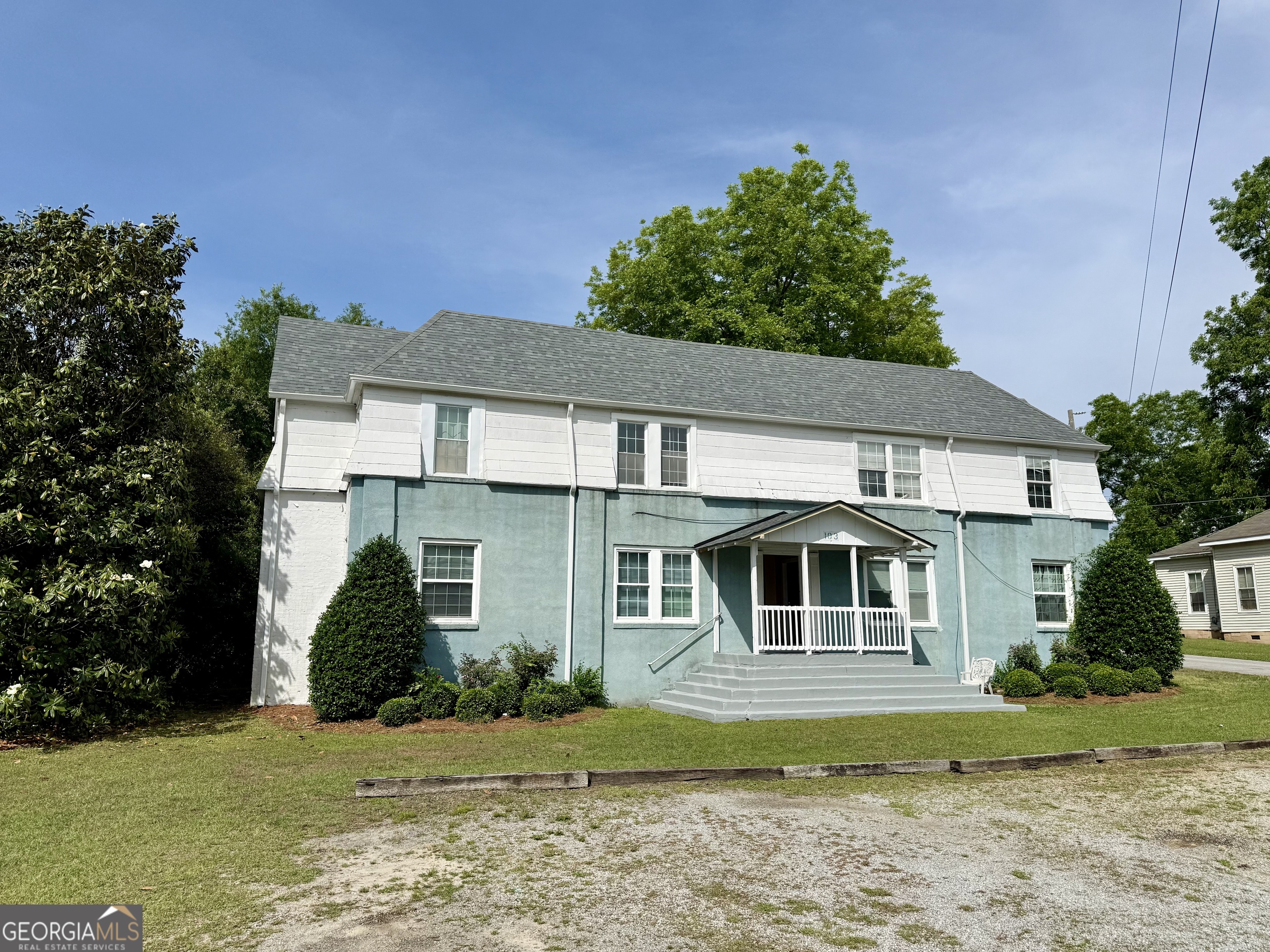 103 Grady Street Thomson, GA 30824 - Photo 27 of 27 a front view of a house with a yard