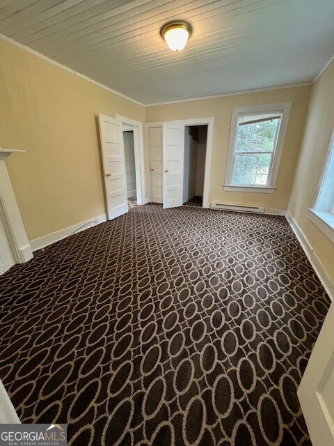 103 Grady Street Thomson, GA 30824 - Photo 5 of 27 a black and white checkered floor